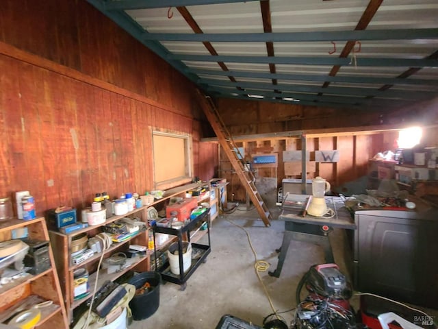 garage with wood walls