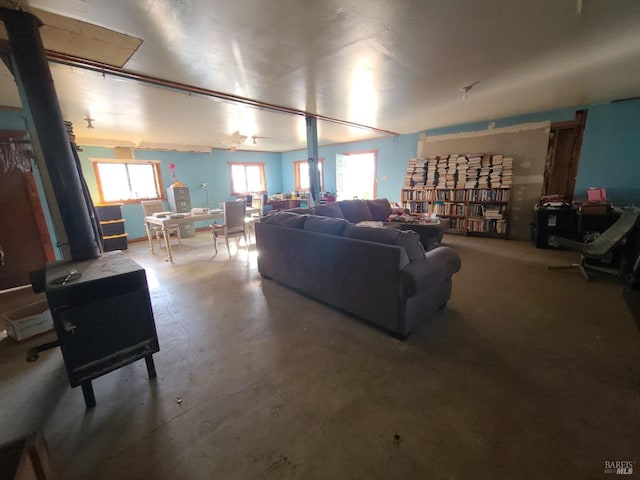 living room featuring concrete flooring