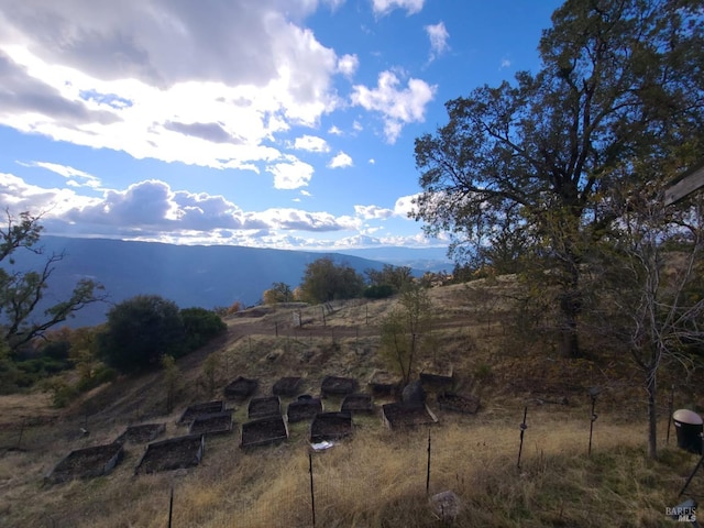 view of mountain feature featuring a rural view