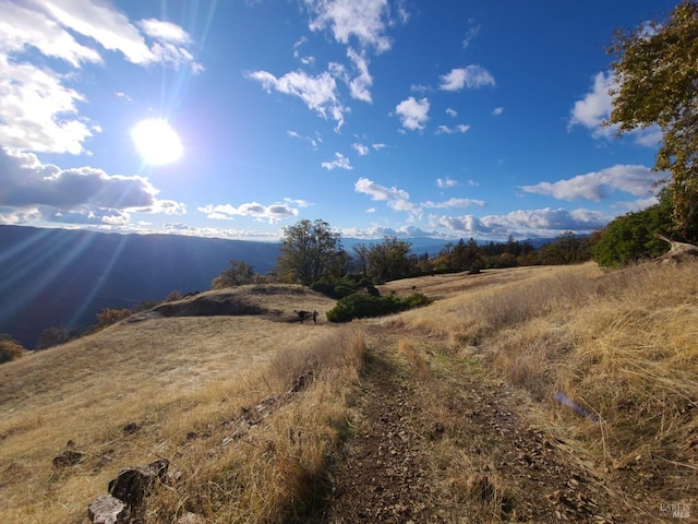 mountain view featuring a rural view