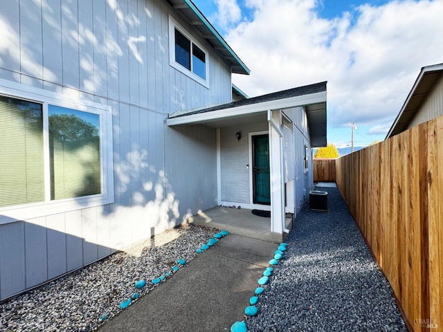 entrance to property featuring central AC