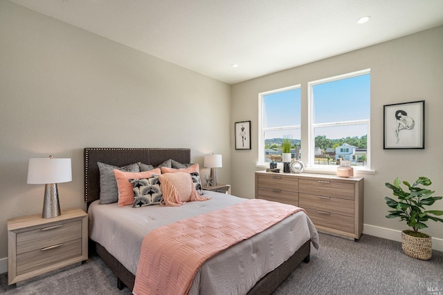 bedroom featuring recessed lighting, carpet, and baseboards