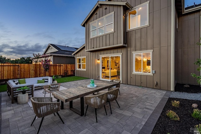 view of patio / terrace with fence and an outdoor living space