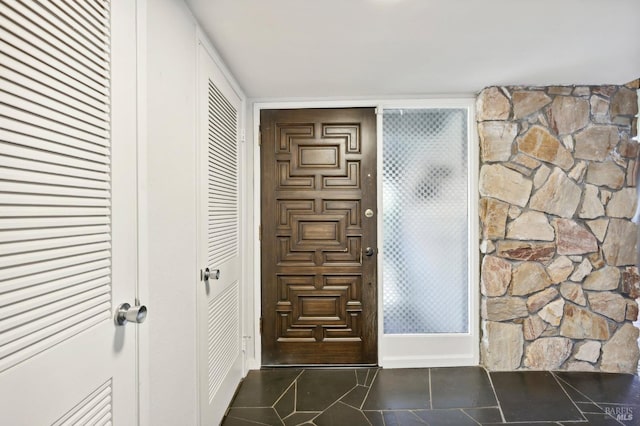 view of tiled foyer entrance