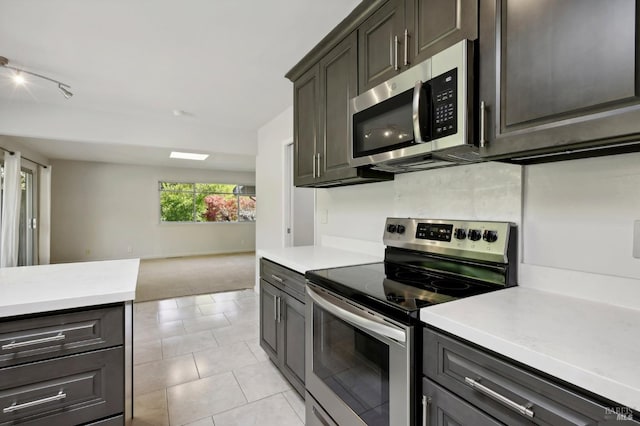 612 Tahos Rd, Orinda, CA 94563 - kitchen featuring stainless steel appliances, light countertops, and open floor plan