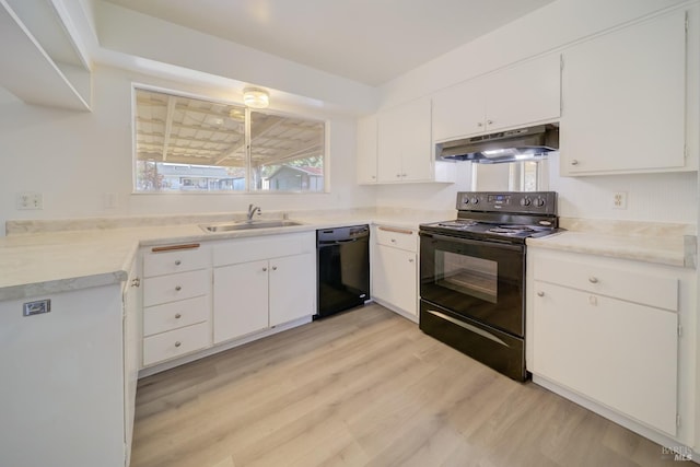 kitchen with white cabinets, sink, light hardwood / wood-style flooring, and black appliances