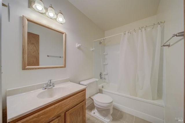 full bathroom featuring vanity, shower / tub combo with curtain, tile patterned floors, and toilet