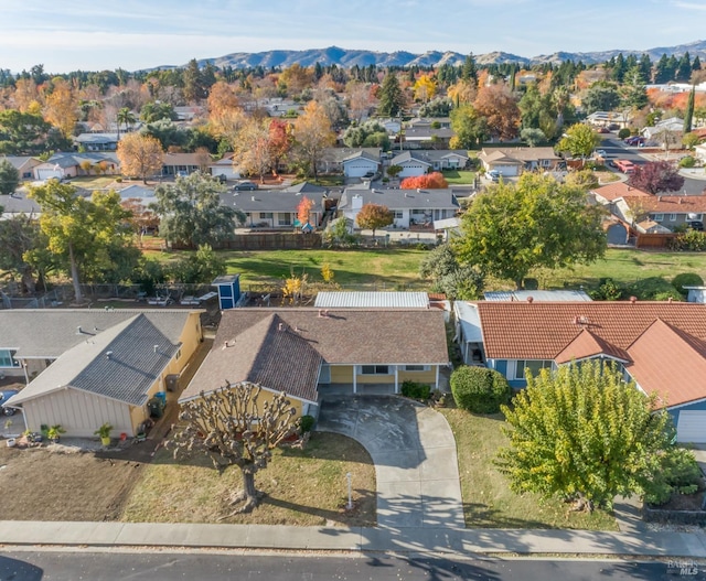 drone / aerial view featuring a mountain view