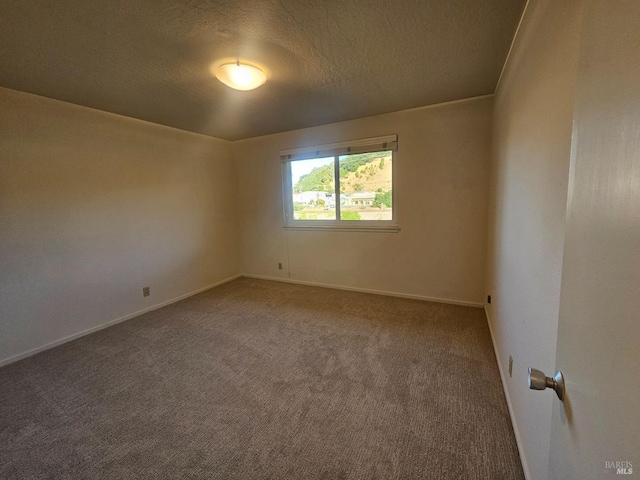 1056 Los Gamos Rd Unit C, San Rafael, CA 94903 - spare room with carpet floors, baseboards, and a textured ceiling