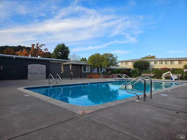 view of pool featuring a patio area