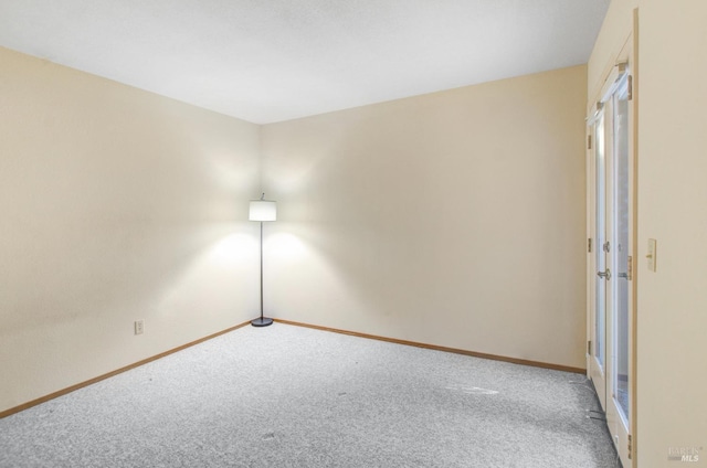 spare room with carpet floors