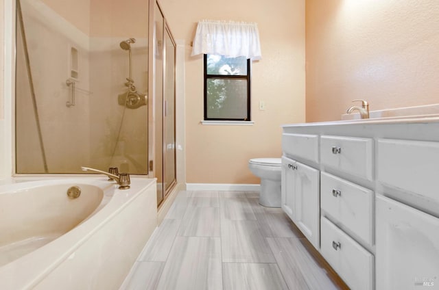 full bathroom with toilet, vanity, and shower with separate bathtub