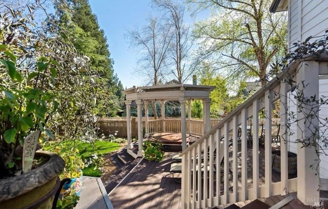 wooden terrace with a water view