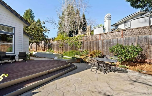 view of patio featuring a wooden deck