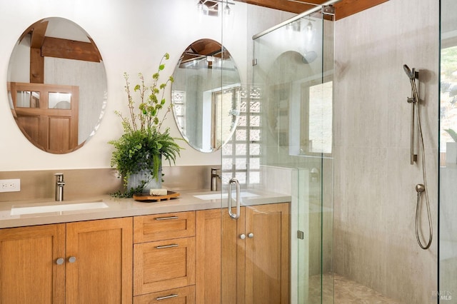 bathroom with vanity and walk in shower