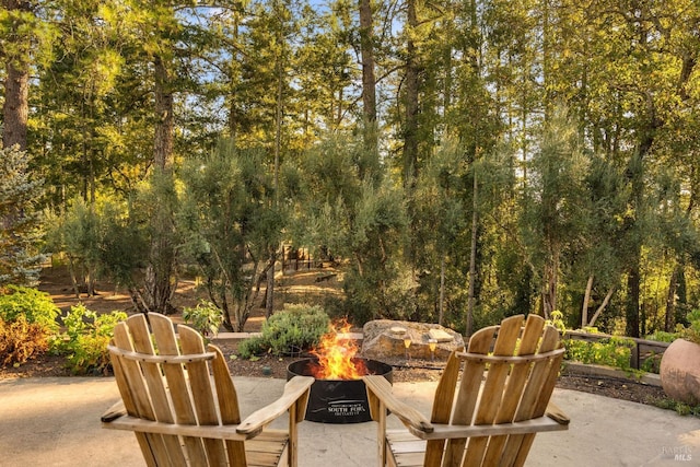 view of patio / terrace featuring a fire pit