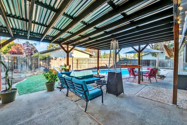 view of patio featuring outdoor lounge area and a fenced in pool