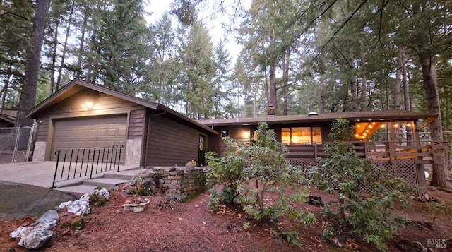 view of front of property featuring a garage