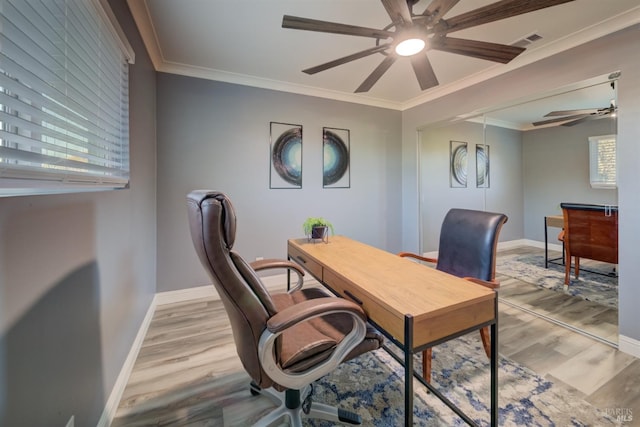 office space with light hardwood / wood-style floors, ceiling fan, and crown molding