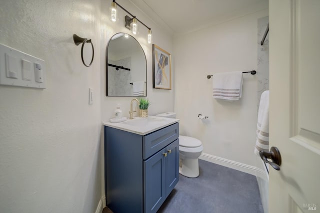 bathroom featuring a shower, vanity, and toilet