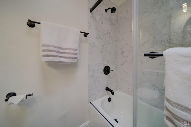 bathroom featuring tiled shower / bath combo