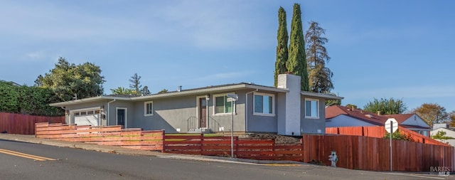 view of front of home featuring a garage