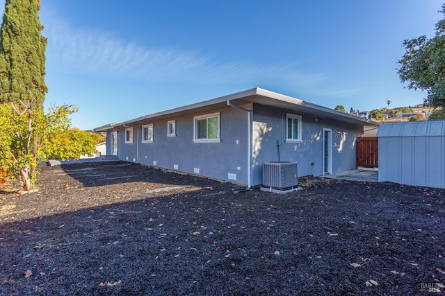 exterior space featuring central AC unit