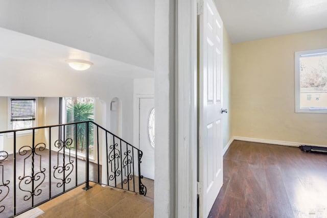 stairway with wood-type flooring