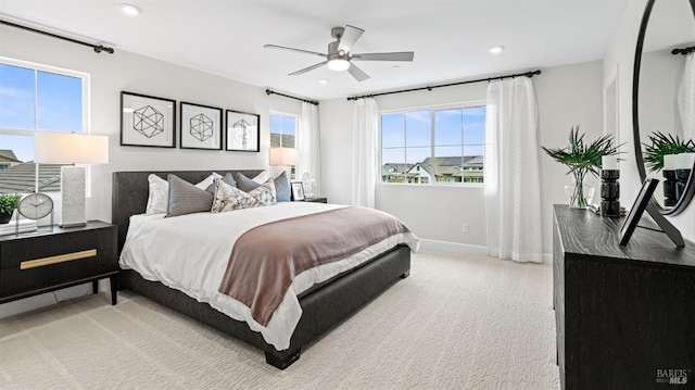 bedroom featuring ceiling fan and carpet floors