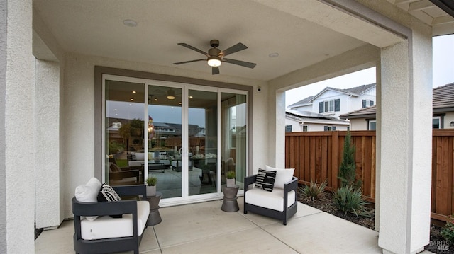 view of patio / terrace featuring ceiling fan