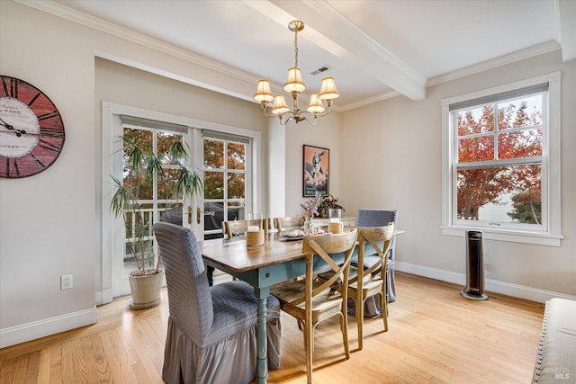 dining space featuring beamed ceiling, light hardwood / wood-style floors, crown molding, and a notable chandelier