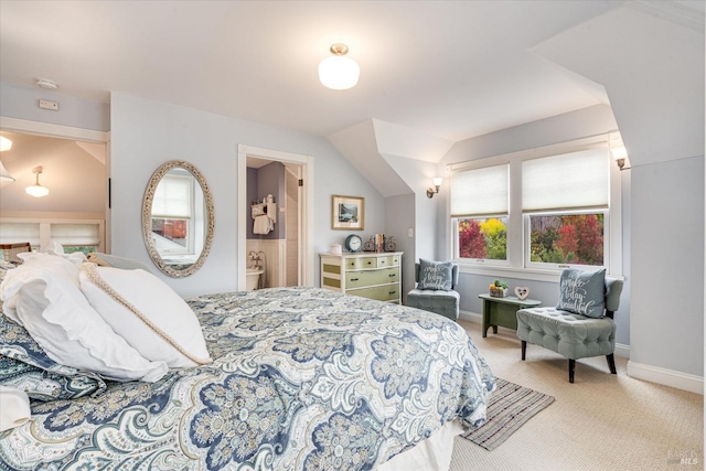 bedroom featuring carpet floors and vaulted ceiling