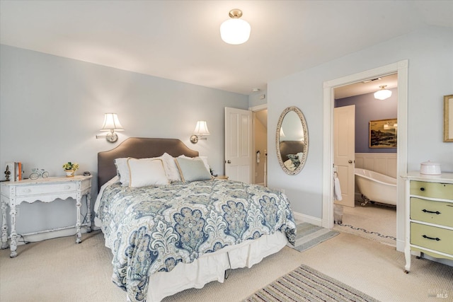 bedroom featuring light colored carpet