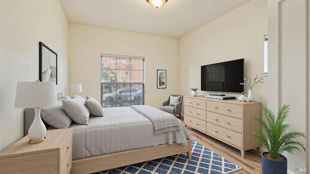 bedroom featuring light wood-type flooring