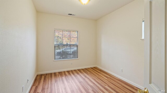 garage featuring independent washer and dryer and a garage door opener