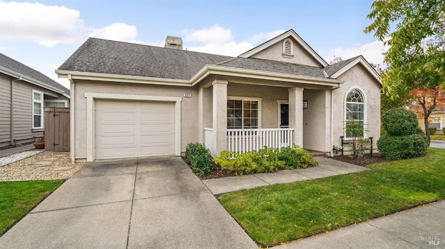 ranch-style home with a porch and a garage