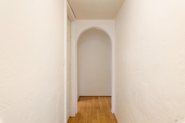 hallway with light wood-type flooring