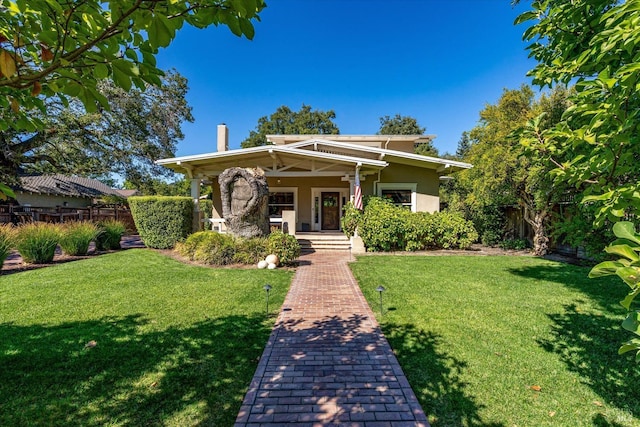 view of front facade featuring a front yard