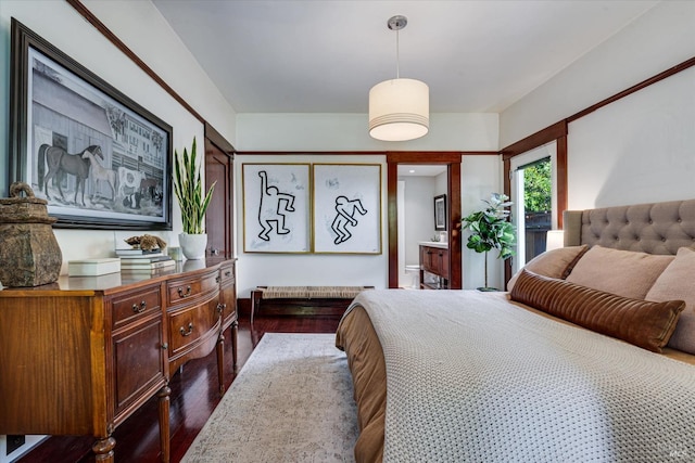 bedroom featuring dark hardwood / wood-style floors