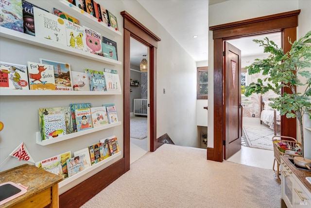 hallway featuring radiator heating unit