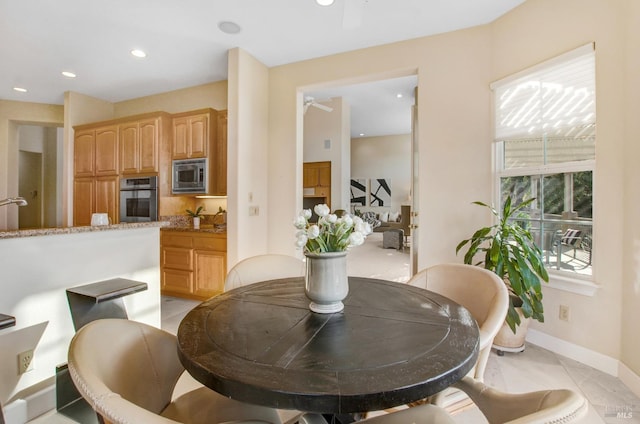 dining room with recessed lighting, a ceiling fan, baseboards, and light tile patterned floors