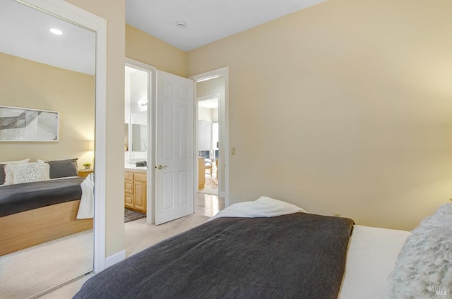 bedroom featuring light colored carpet