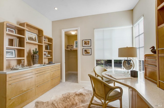 office space featuring recessed lighting, light colored carpet, and baseboards