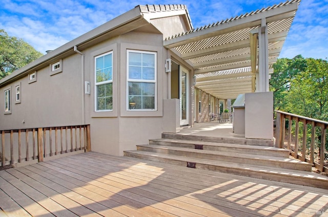 wooden deck with a pergola