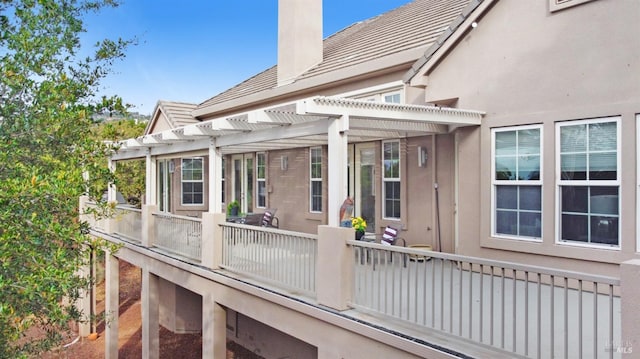 wooden deck featuring a pergola