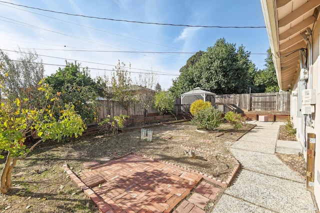 view of yard with a gazebo and a patio area