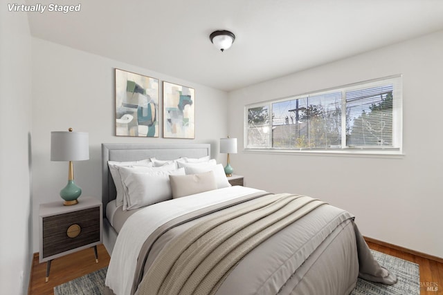 bedroom with wood-type flooring