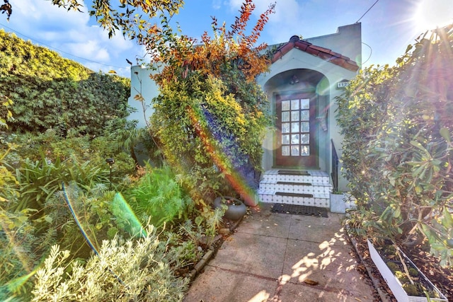 entrance to property featuring french doors