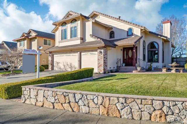 view of front facade featuring a front yard and a garage