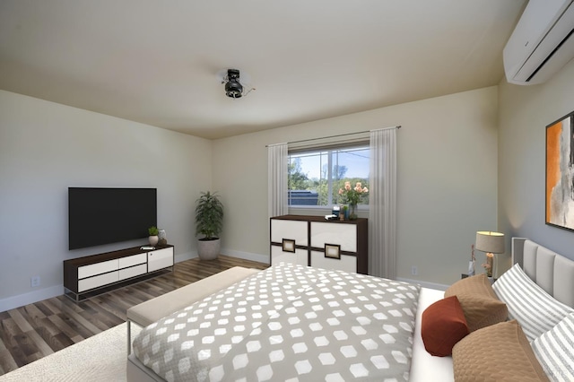 bedroom with dark hardwood / wood-style flooring and a wall unit AC